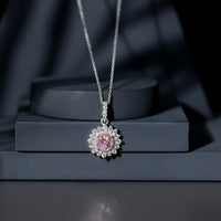 Natural 1.2 Carat Round Pink Tourmaline and Diamond Halo Pendant