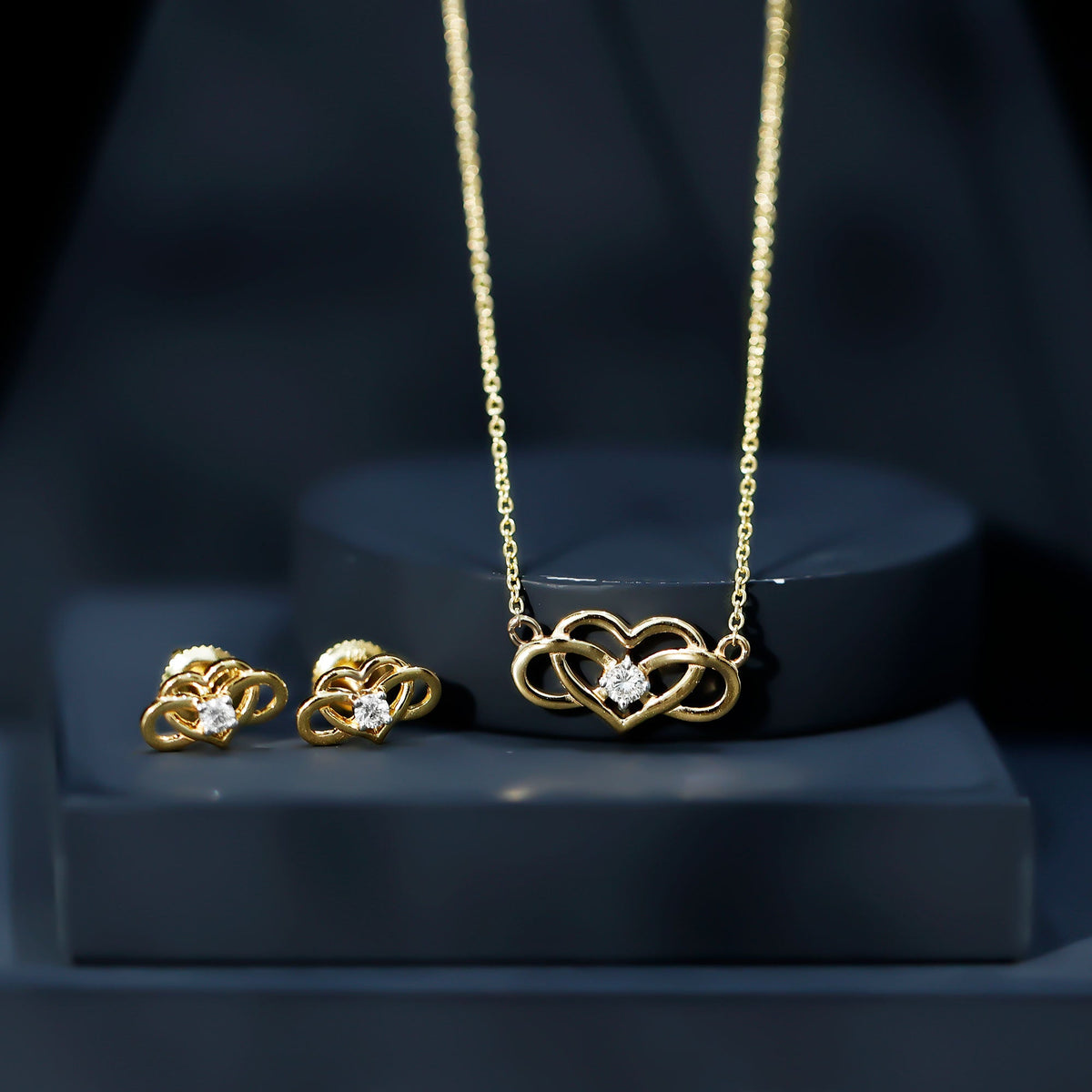 Round cut diamond infinity heart jewelry set by Rosec Jewels featuring sparkling diamonds and elegant design.