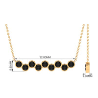 Black Onyx bar pendant necklace with nine stones in bezel setting, by Rosec Jewels, shown on a chain.
