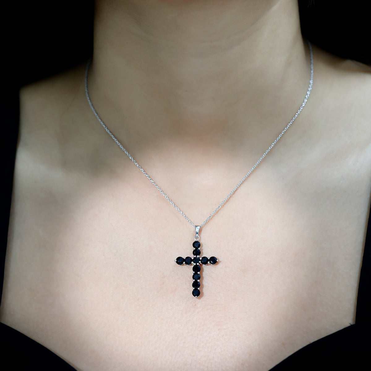 Natural black onyx cross pendant necklace for women with silver chain from Rosec Jewels, showcasing the elegant pendant design.