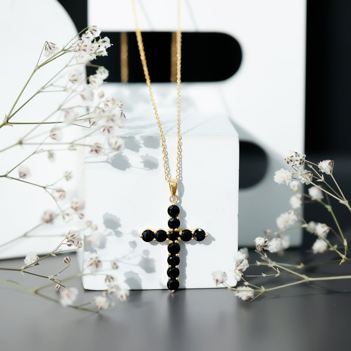 Natural black onyx cross pendant necklace for women by Rosec Jewels, featuring a sleek pendant design on a chain.