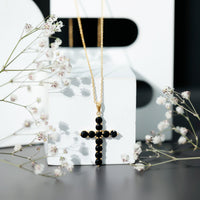 Natural black onyx cross pendant necklace for women by Rosec Jewels, featuring a sleek pendant design on a chain.