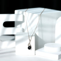 Pear Shaped Black Onyx and Diamond Leaf Pendant Necklace