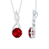 Cushion cut created ruby solitaire pendant with diamond accent, Rosec Jewels jewelry showcasing elegant pendant design.