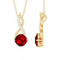 Cushion cut created ruby solitaire pendant with diamond accent from Rosec Jewels, showcasing a elegant jewelry pendant.