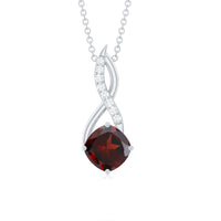 Cushion garnet drop pendant necklace with diamond accents from Rosec Jewels, showcasing a vibrant red gemstone and elegant design.
