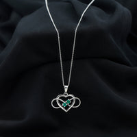 Heart infinity pendant necklace by Rosec Jewels featuring a real emerald gemstone and intricate silver design.
