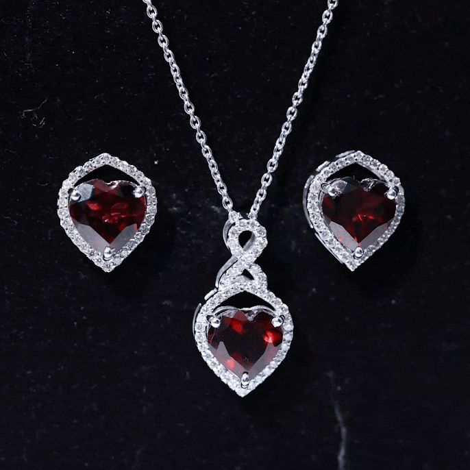 Real garnet and diamond infinity heart jewelry set featuring a necklace and earrings from Rosec Jewels.