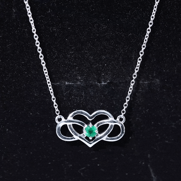 Yellow gold emerald heart and infinity pendant necklace for women by Rosec Jewels, featuring a delicate chain and elegant design.