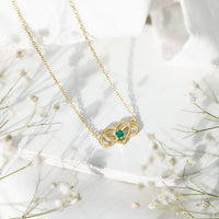 Emerald heart and infinity pendant necklace for women by Rosec Jewels featuring a silver chain and green gemstone accents.