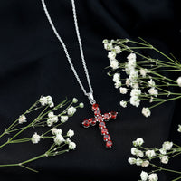 Genuine garnet cross pendant necklace from Rosec Jewels featuring a polished gold-tone design and detailed cross-shaped charm.