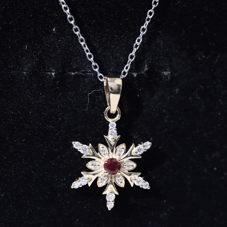 Yellow lab-created ruby snowflake pendant with diamond accents, featuring intricate design and sparkling gem details by Rosec Jewels.