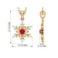 Lab-created ruby snowflake pendant with diamond accents showcasing intricate design and sparkling gemstones.
