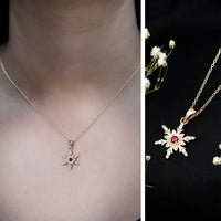 Lab created ruby snowflake pendant with diamond accent, featuring intricate design and sparkling gemstones, by Rosec Jewels.