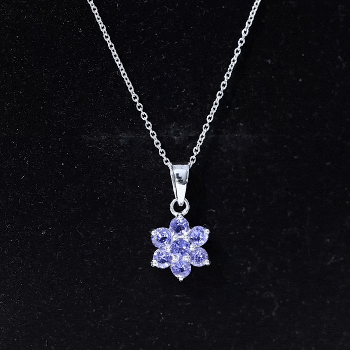 Natural Tanzanite flower cluster pendant necklace with yellow accents, featuring a delicate floral design from Rosec Jewels.