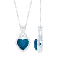 Heart-shaped London Blue Topaz infinity pendant with diamonds by Rosec Jewels, featuring a 2-carat gemstone and intricate design.