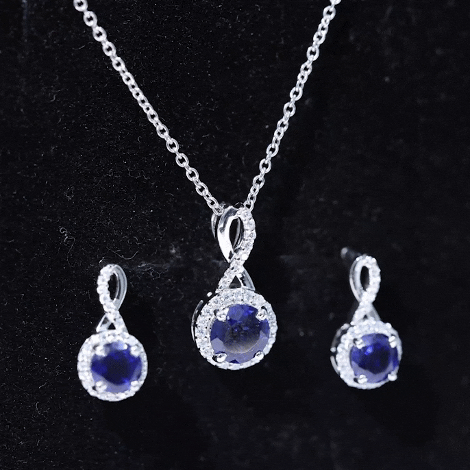 Certified 2.5 carat lab-grown blue sapphire bridal jewelry set featuring matching necklace and earrings by Rosec Jewels.