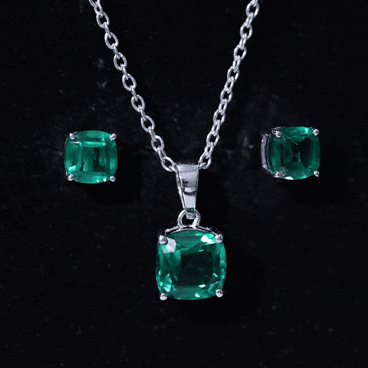 Yellow lab-grown emerald solitaire jewelry set featuring a necklace and earrings from Rosec Jewels.