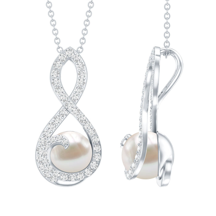 Freshwater white pearl and moissanite infinity pendant in silver, featuring elegant jewelry design with sparkling stones.