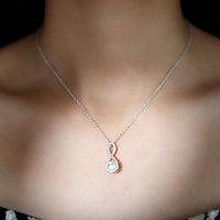 Freshwater White Pearl and Moissanite Infinity Pendant in Silver