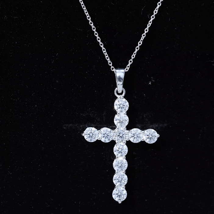 Yellow gold round moissanite cross pendant necklace by Rosec Jewels with a polished finish and delicate chain.