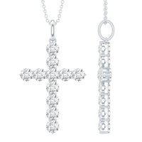 Round moissanite cross pendant necklace by Rosec Jewels featuring a sparkling certified moissanite gemstone and silver chain.