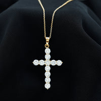 Round moissanite cross pendant necklace by Rosec Jewels featuring a sparkling circular moissanite stone on a silver chain.