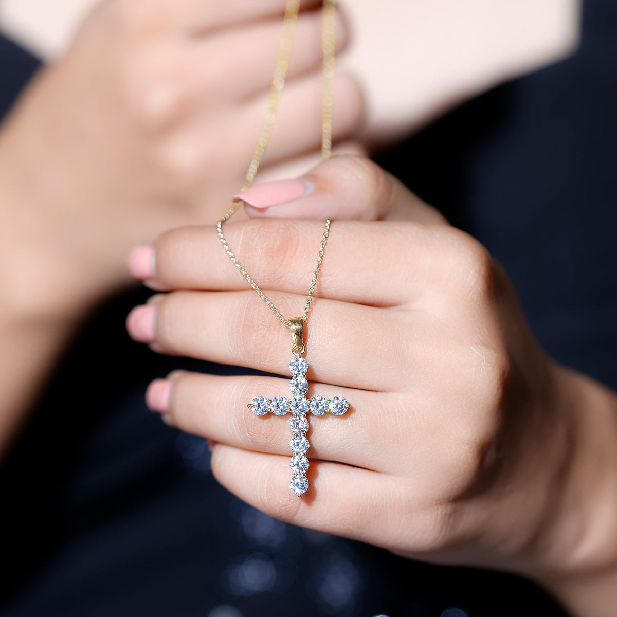 Round moissanite cross pendant necklace from Rosec Jewels, showcasing a sparkling cross design on a delicate chain.