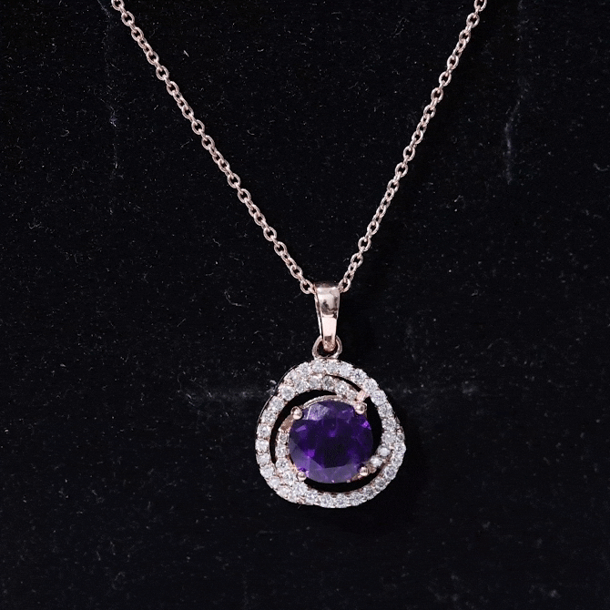 Natural amethyst and diamond swirl pendant necklace featuring a yellow gold chain, crafted by Rosec Jewels.