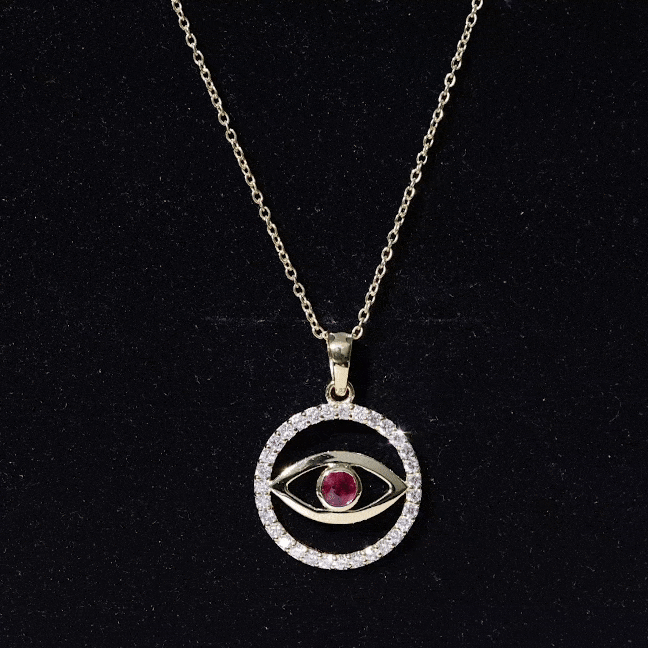 Yellow gold evil eye pendant necklace featuring real ruby and diamond accents by Rosec Jewels.
