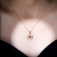 Real ruby and diamond evil eye pendant necklace by Rosec Jewels with intricate pendant design and sparkling gemstones.