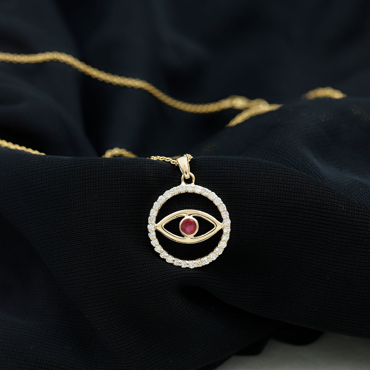 Real ruby and diamond evil eye pendant necklace from Rosec Jewels, showcasing vibrant gemstones and intricate design.