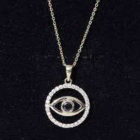 Black Onyx Evil Eye pendant with Moissanite eternity circle, featuring a protective evil eye design by Rosec Jewels.