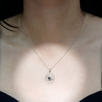 Black Onyx Evil Eye pendant with Moissanite eternity circle, featuring a protective evil eye design from Rosec Jewels.