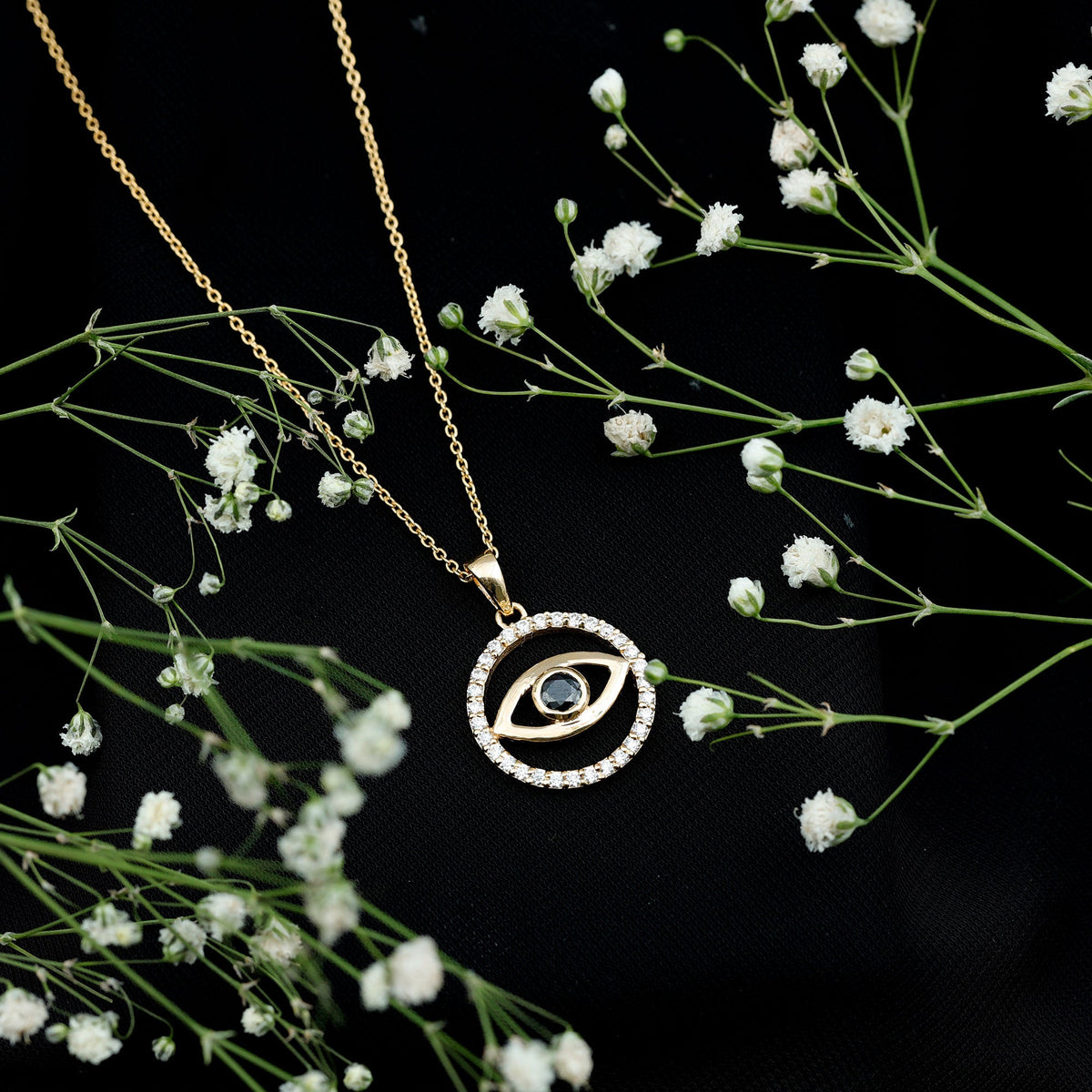 Black Onyx Evil Eye pendant with Moissanite eternity circle, featuring a protective evil eye design by Rosec Jewels.