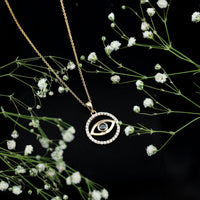 Black Onyx Evil Eye pendant with Moissanite eternity circle, featuring a protective evil eye design by Rosec Jewels.