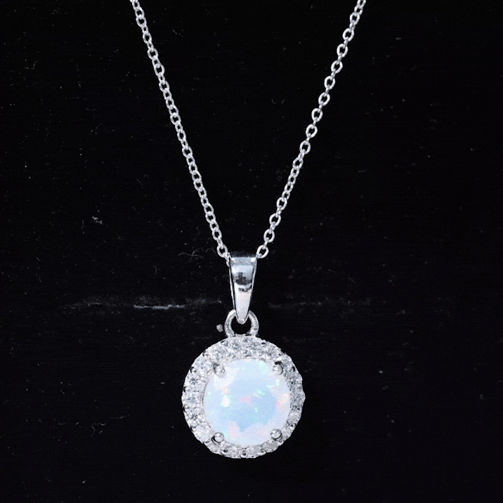 Ethiopian opal and moissanite halo pendant necklace with silver chain, showcasing sparkling gemstones and elegant design.