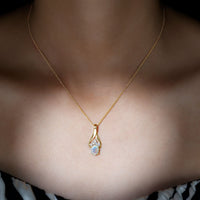 Natural Oval Ethiopian Opal and Moissanite Teardrop Necklace With Chain