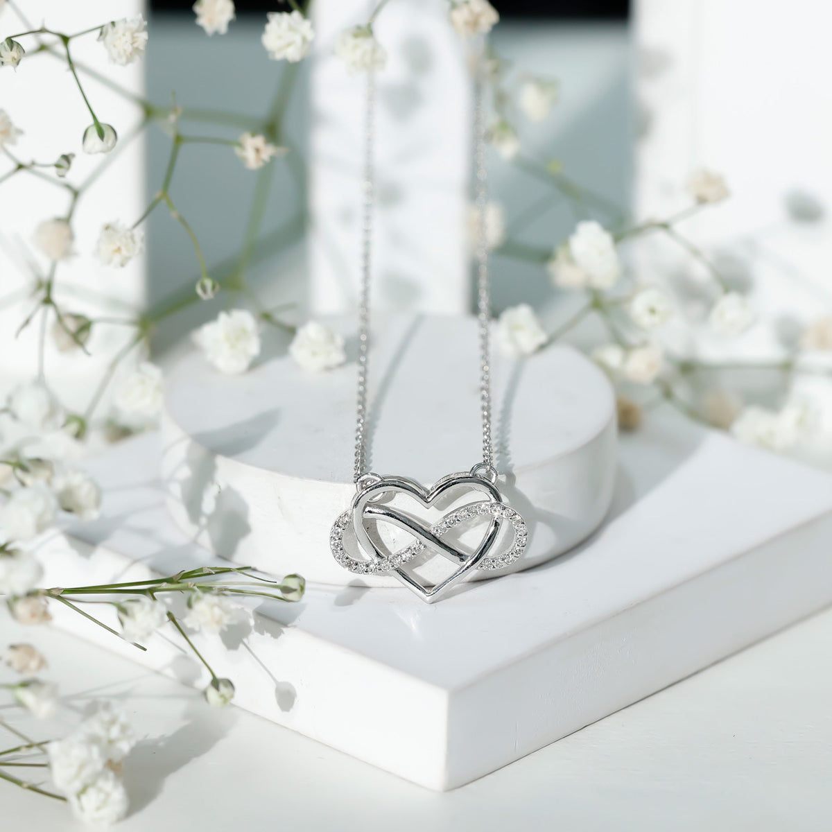 Moissanite Infinity Heart Necklace In Sterling Silver