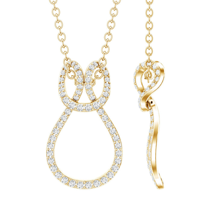 Rosec Jewels twisted infinity pendant necklace with a sparkling moissanite stone on a delicate chain.