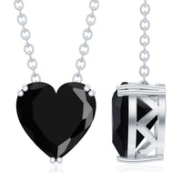 Heart-shaped black spinel pendant with a 2-carat solitaire in a double prong setting by Rosec Jewels.