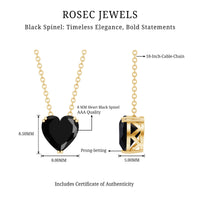 Heart-shaped black spinel solitaire pendant in a double prong setting, featuring a 2 carat black spinel gemstone.