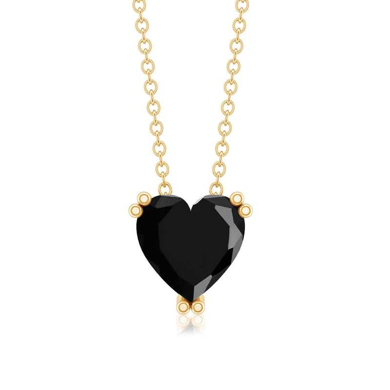 Heart-shaped black onyx solitaire pendant necklace by Rosec Jewels featuring a 2-carat black onyx gemstone.