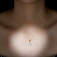 Heart-shaped Ethiopian opal infinity pendant with diamonds, by Rosec Jewels, showcasing a sparkling 2-carat gemstone and elegant design.