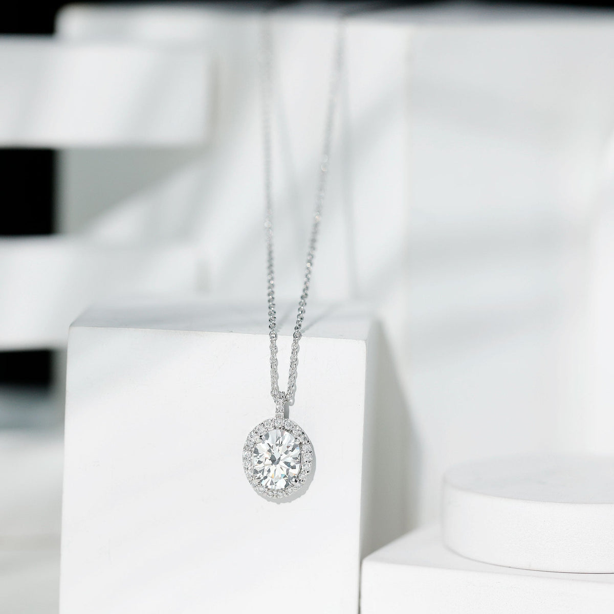 Oval Simulated Diamond Cocktail Halo Pendant