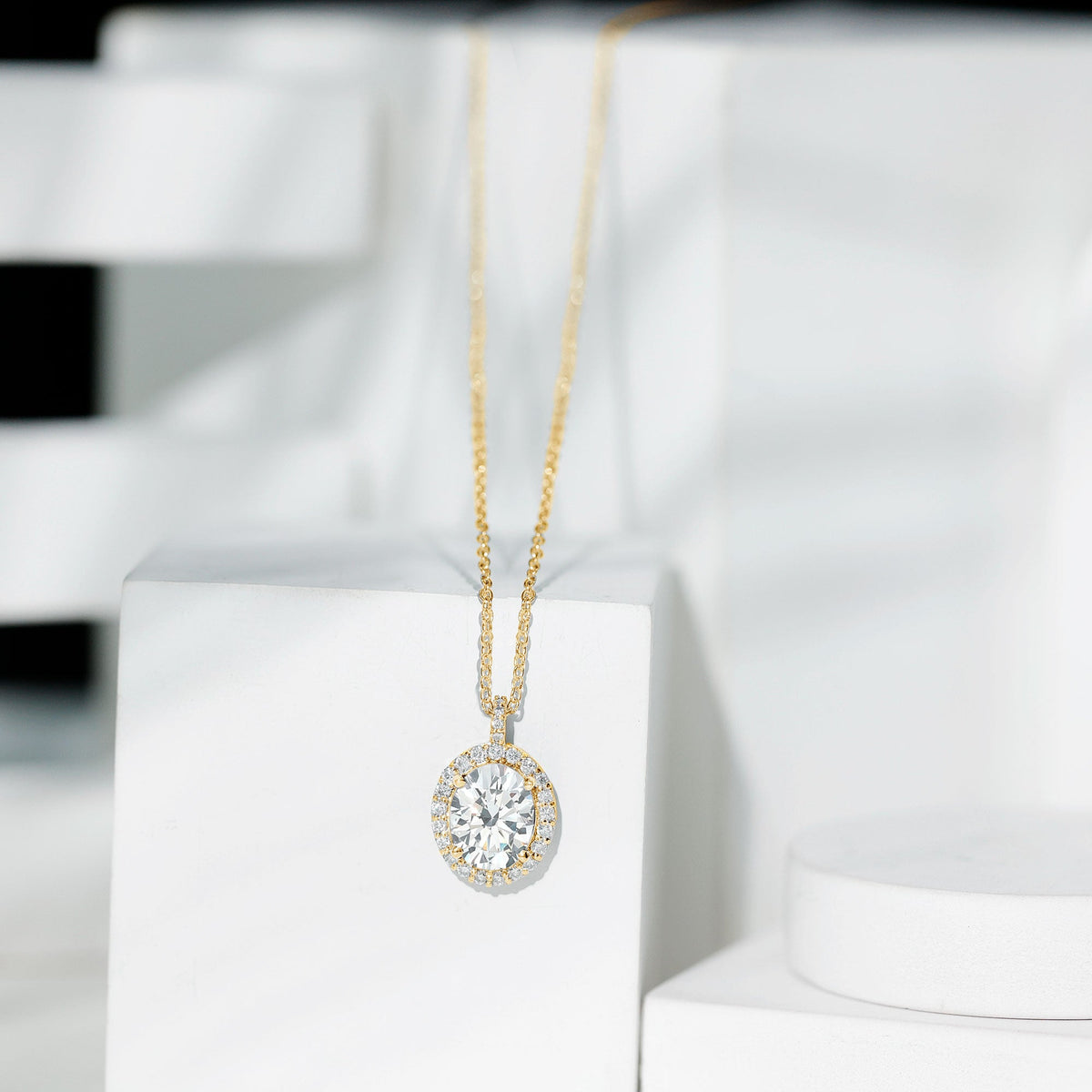 Oval Simulated Diamond Cocktail Halo Pendant