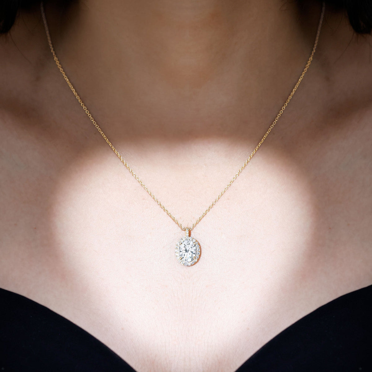 Oval Simulated Diamond Cocktail Halo Pendant
