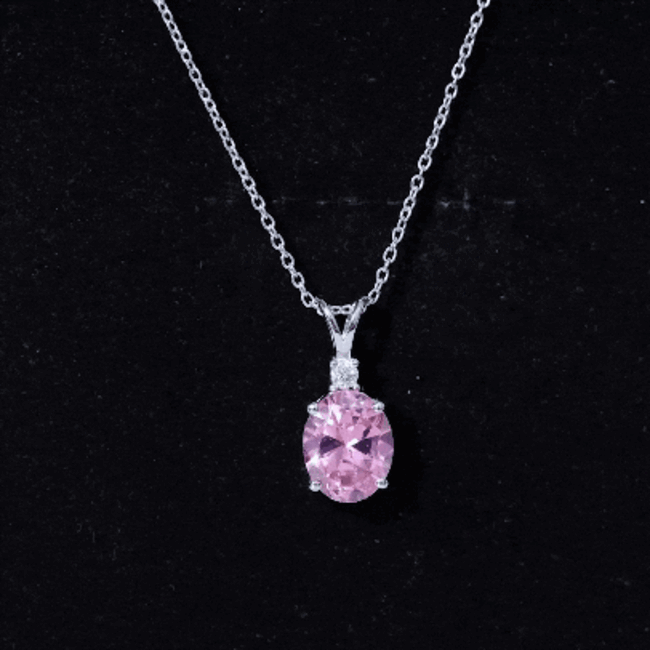 Oval pink sapphire pendant with silver chain, lab-grown 4-carat gemstone, set in a Rosec Jewels pendant for elegant jewelry.