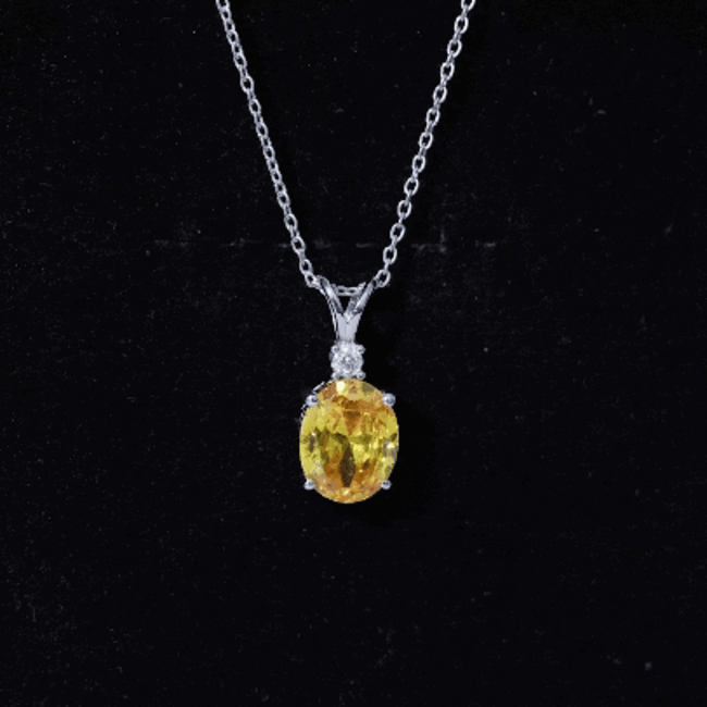Oval yellow sapphire pendant with 4-carat lab-grown gemstone on silver chain, from Rosec Jewels.