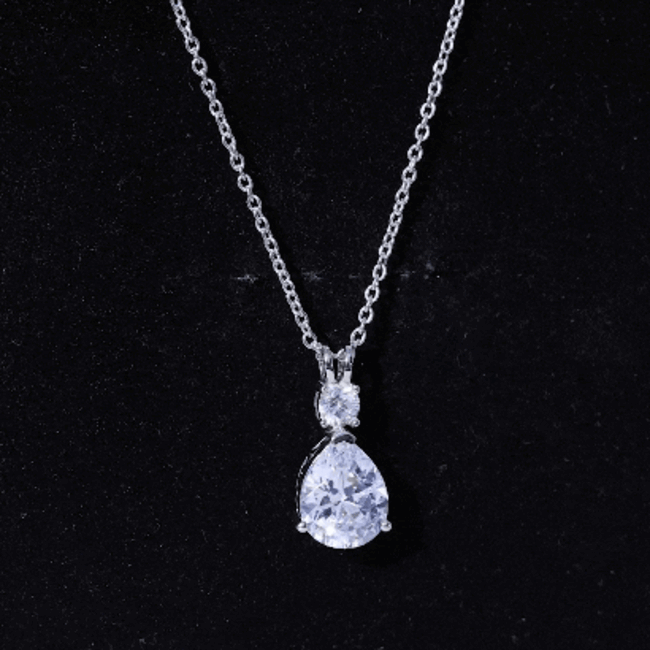 Silver chain pendant with a 3-carat cubic zirconia pear-shaped drop from Rosec Jewels, elegant jewelry accessory.